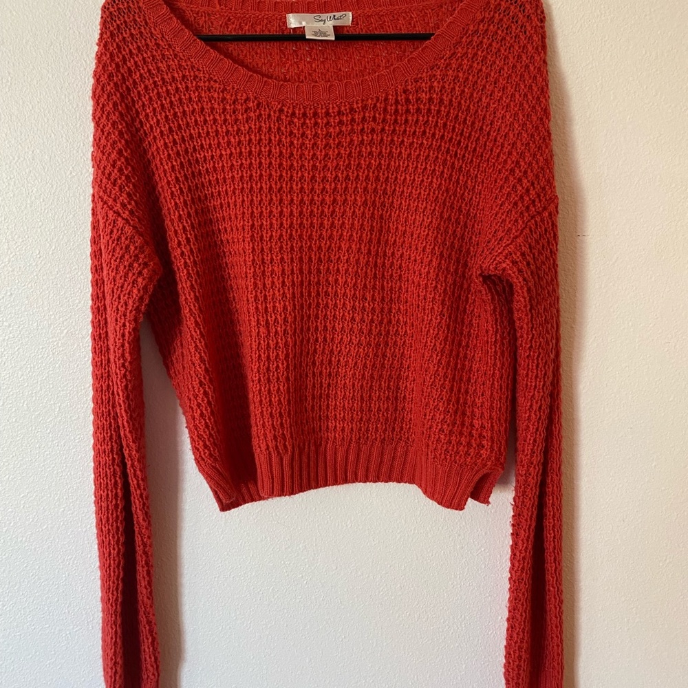 Lighter sweater. Knitted material.